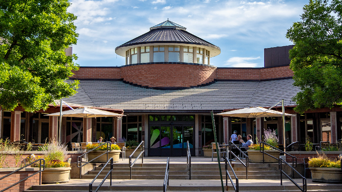 Koelbel_location_1200x640 A photo of the outside of a well-kept library in Colorado Springs.